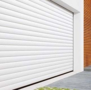 Aluroll insulated automatic roller garage door fully finished in White.